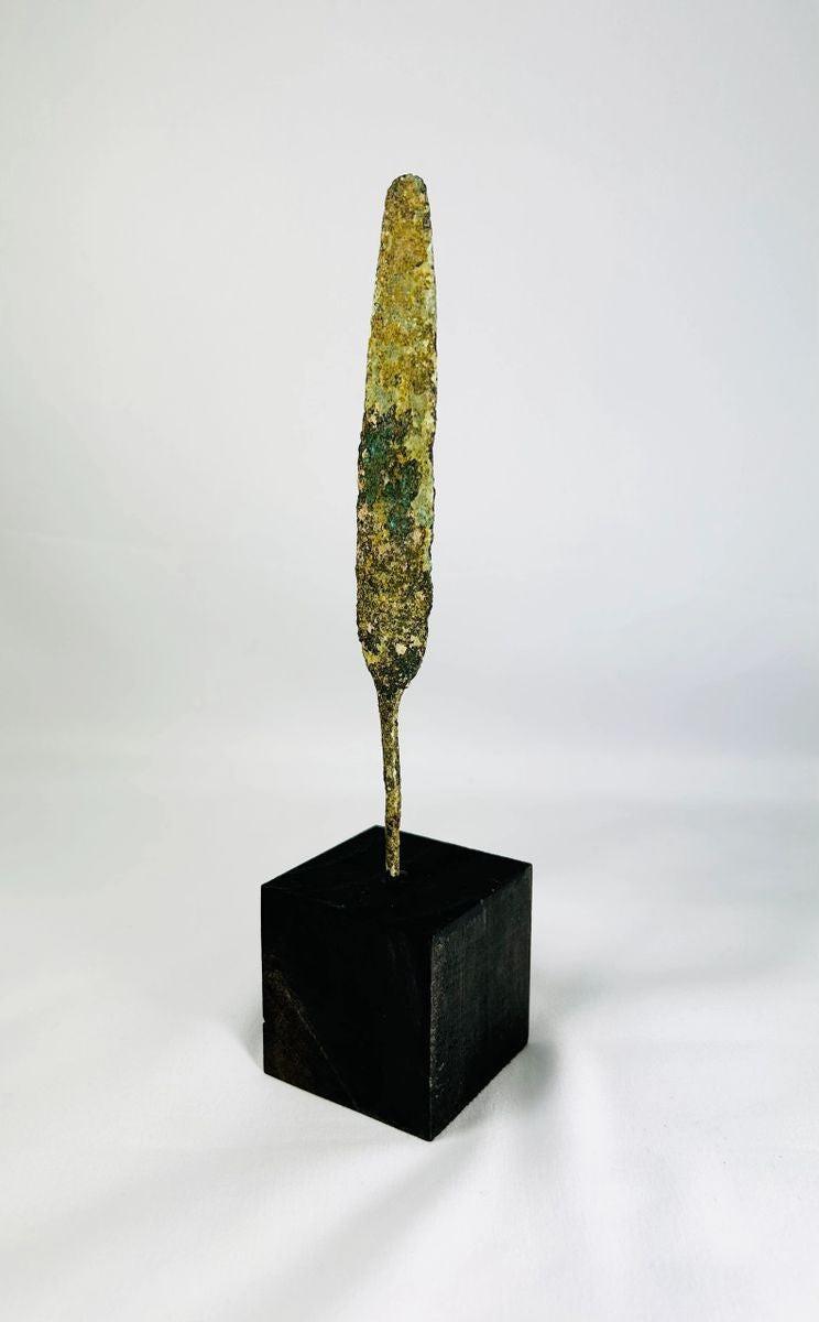 Authentic ancient bronze spearhead reflecting early metallurgical craftsmanship