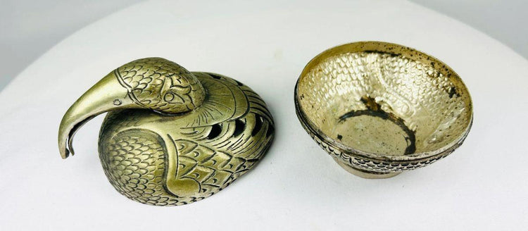 Antique South Indian temple censer with stylized peacock design