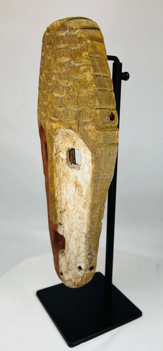 Authentic Sepik River hardwood mask with dual-tone red and white pigments