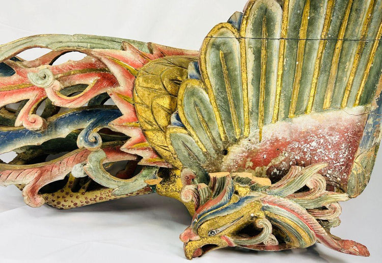 Front close-up of Qing Dynasty phoenix relief carved from camphor wood, showing detailed gilded feathers, flowing cloud motifs, and red-blue polychrome finish – Relic and Rarity.