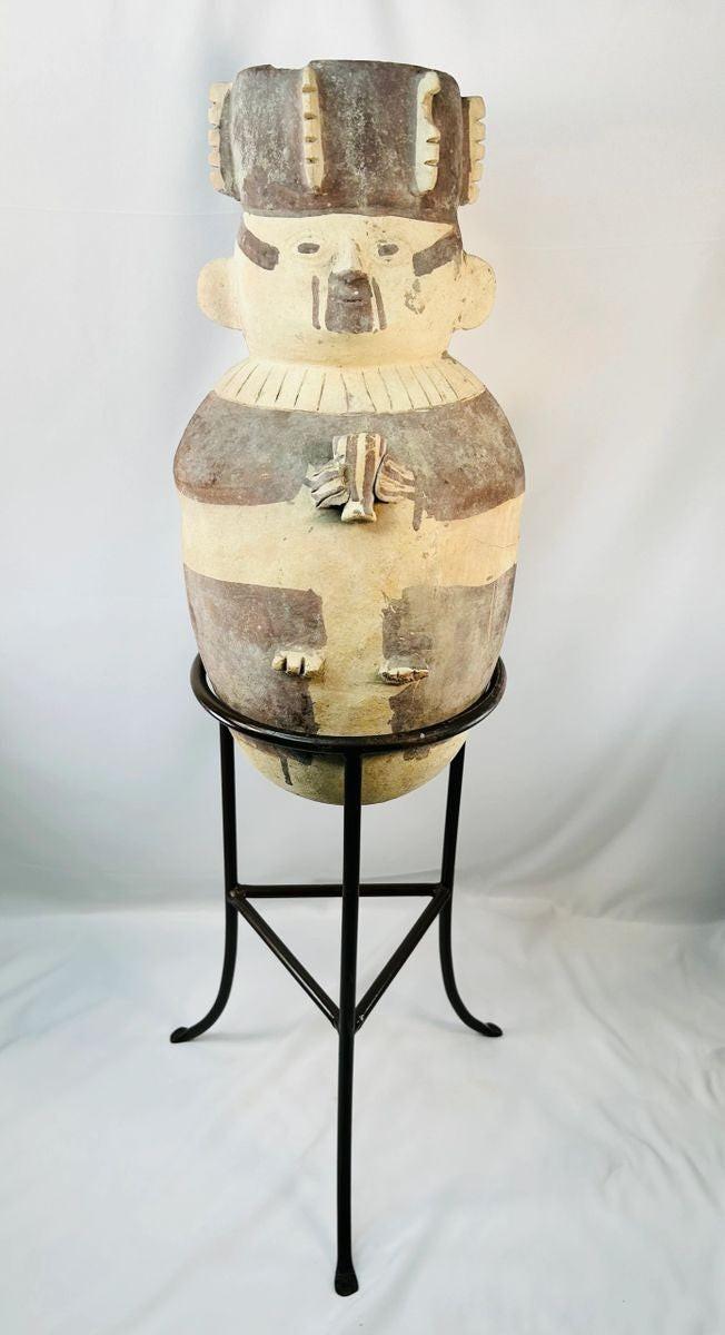 Pre-Columbian Chancay pottery urn with hand-sculpted human figure