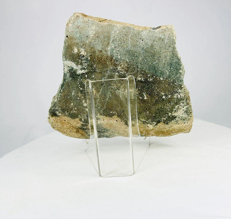 Ancient Mediterranean limestone fragment with weathered surface and centuries-old patina