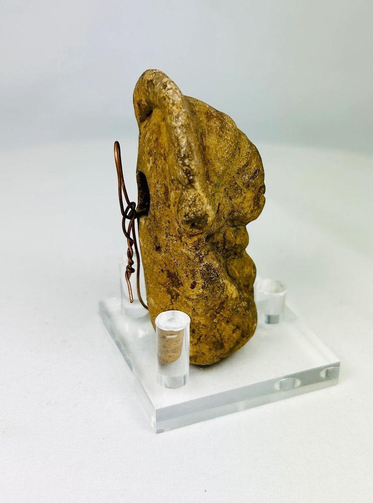 Three-quarter view of Pre-Columbian bust revealing craftsmanship and natural patina.