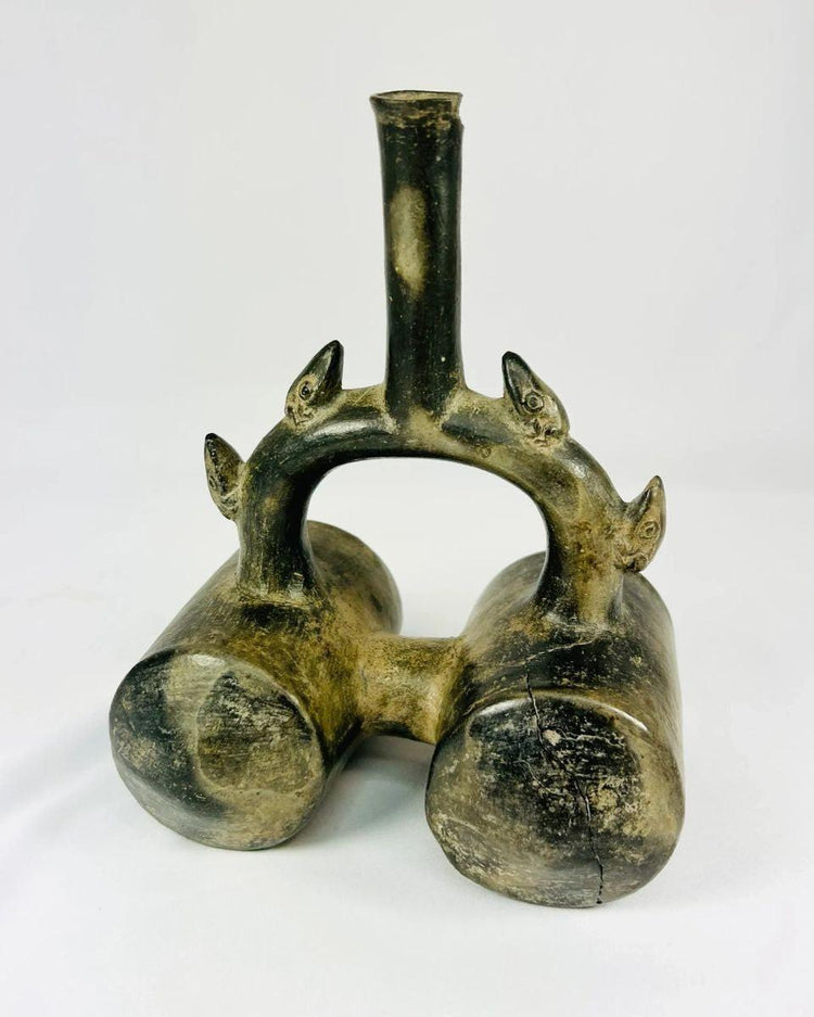 Authentic Chimu stirrup vessel with double chambers and sculpted spouts