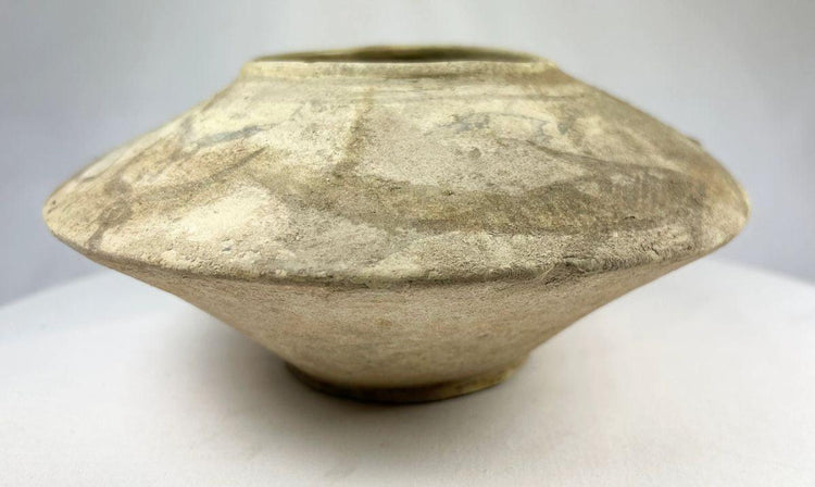 Indus Valley ceramic vessel with flared rim and painted Chalcolithic fish design