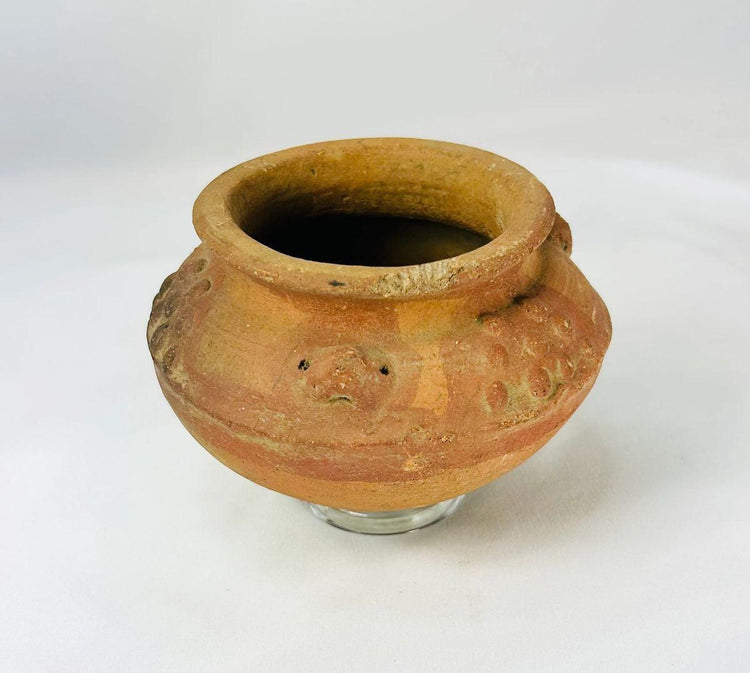 Pre-Columbian ritual vessel with fertility and spiritual symbolism