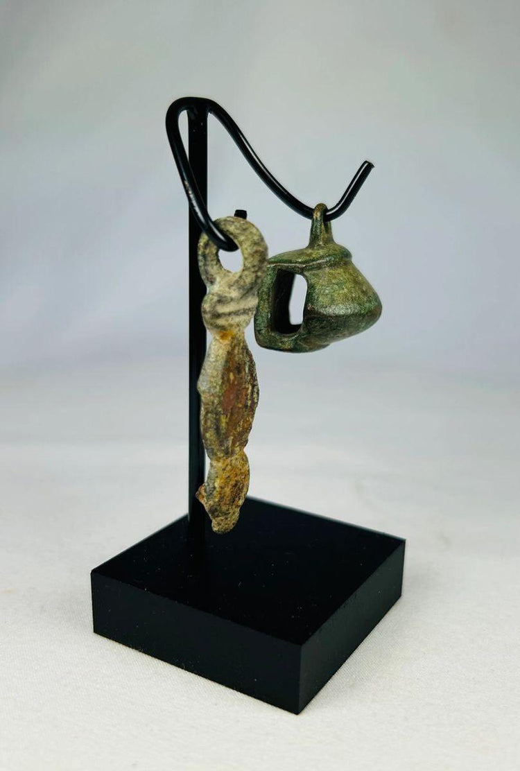 Authentic Ancient Roman bronze pendant and bell reflecting everyday life and ritual use