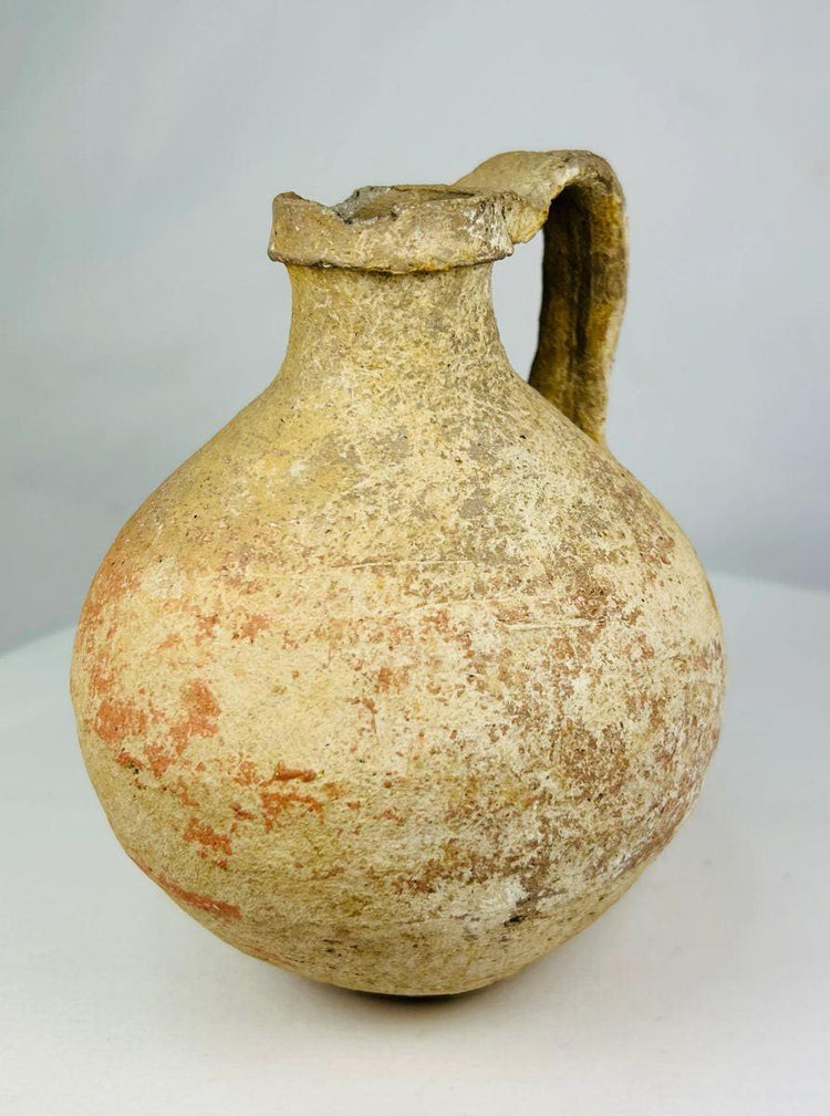 Greco-Roman period Egyptian jug with rounded body and spouted rim