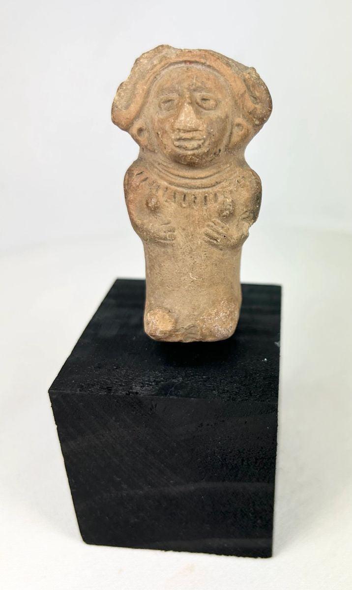 Classic Veracruz terracotta female figure with wide headdress and ritual posture