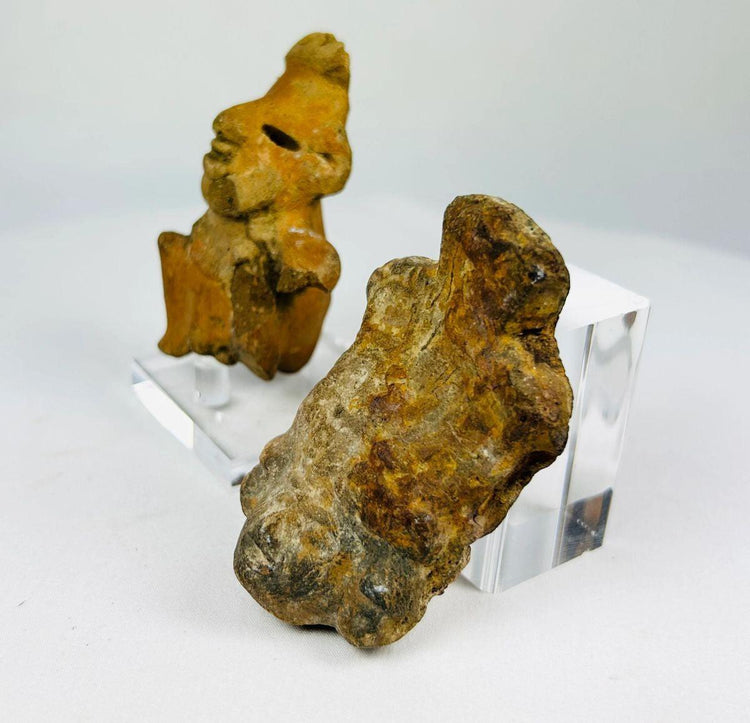 Ancient Mexican pottery torso fragment with mineral encrustation