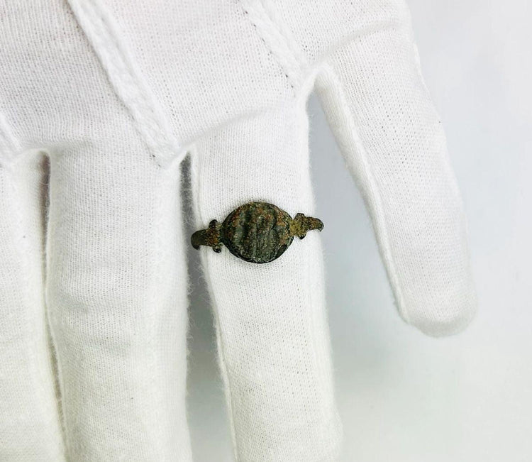 Roman bronze ring personal seal featuring Neptune symbol and maritime motif