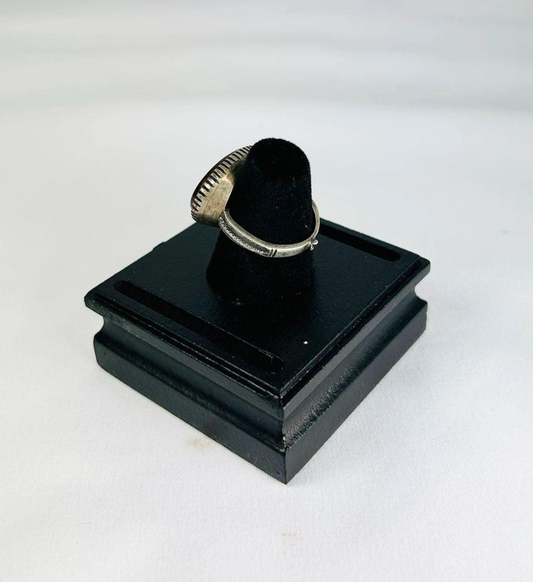 Ancient Near Eastern oval carnelian intaglio ring, 1st millennium BCE, silver bezel, engraved animal and symbolic motifs