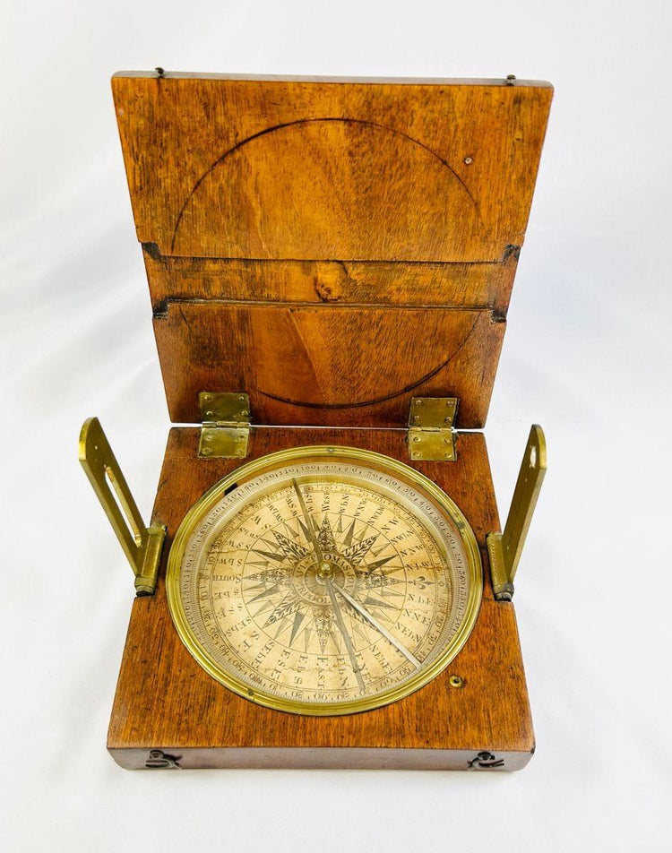 Back view of antique walnut case housing mid-19th century alidade surveying compass