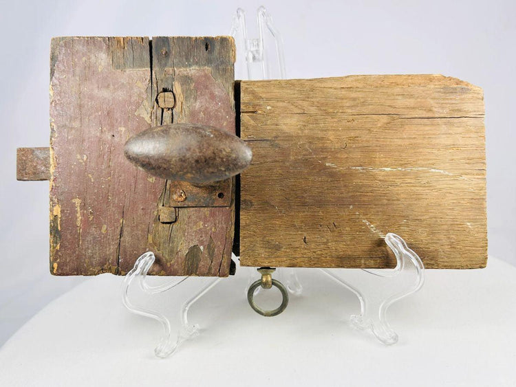 Early American wooden locking mechanism with hand-forged iron fittings
