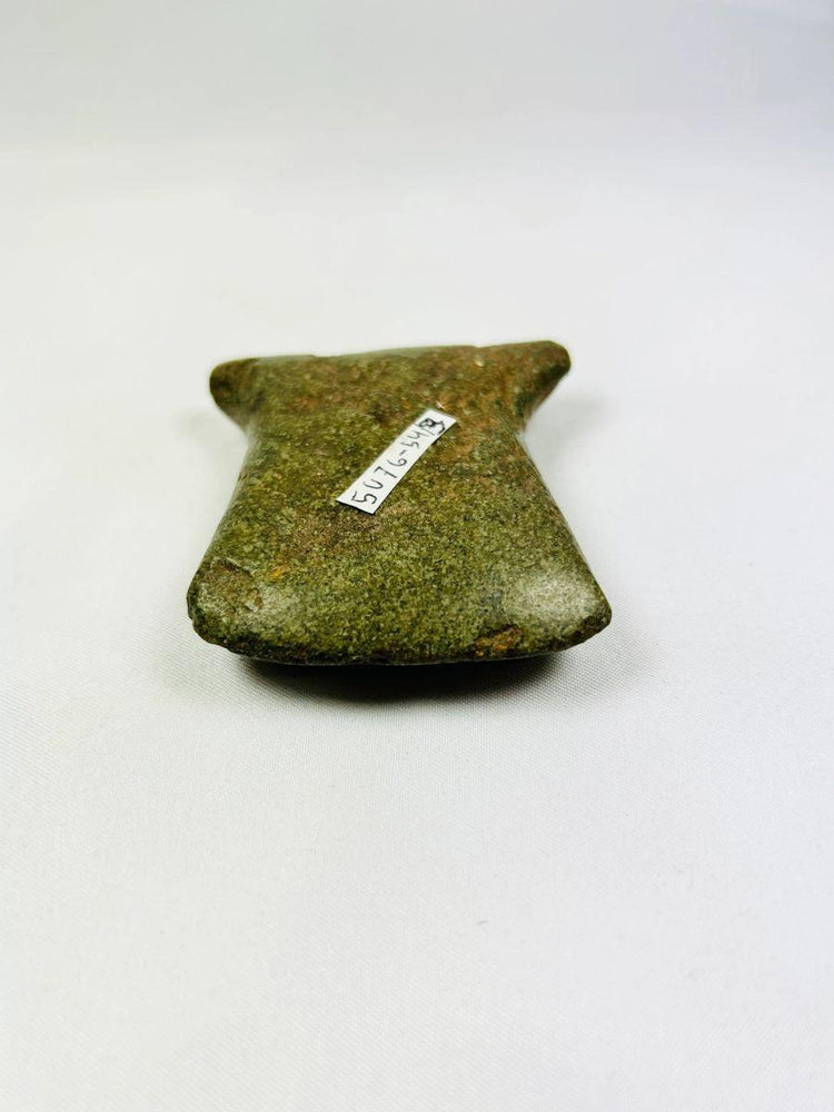 Small Pre-Columbian Andean notched stone axe, 500–1500 CE, Ecuador/Peru, used for woodworking and agriculture.