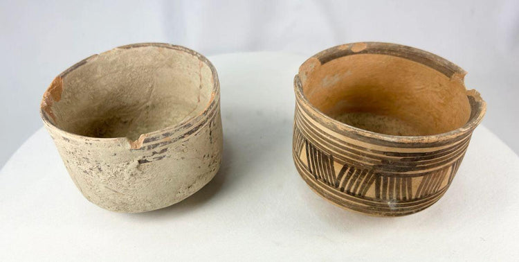 Ancient Indus Valley pottery with rimmed edges and hand-crafted design