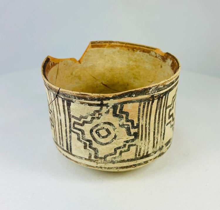 Side view of 3rd Millennium BCE Harappan vessel highlighting balanced proportions and artwork.