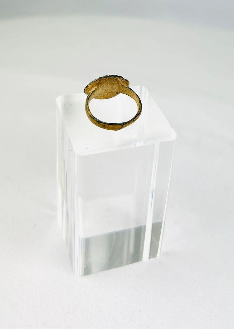 Authentic Roman bronze ring displaying mineralized surface and natural patination