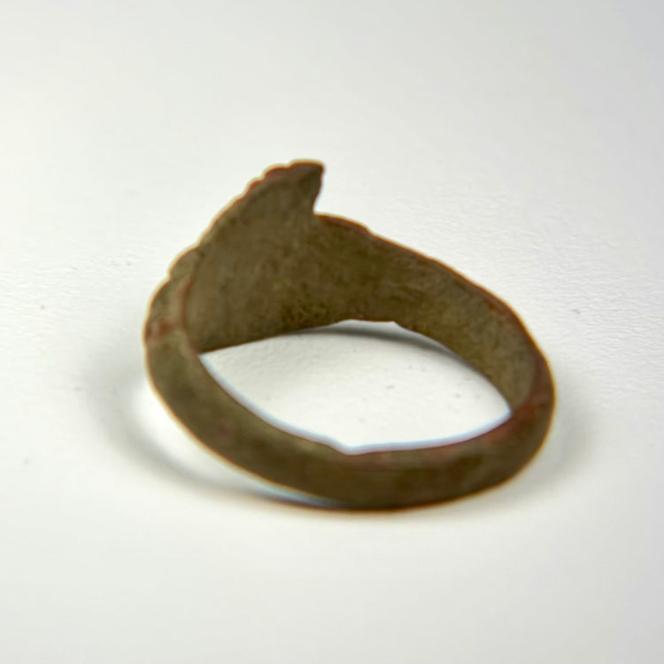 Mediterranean bronze ring with clean bezel lines and naturally aged green-brown patina