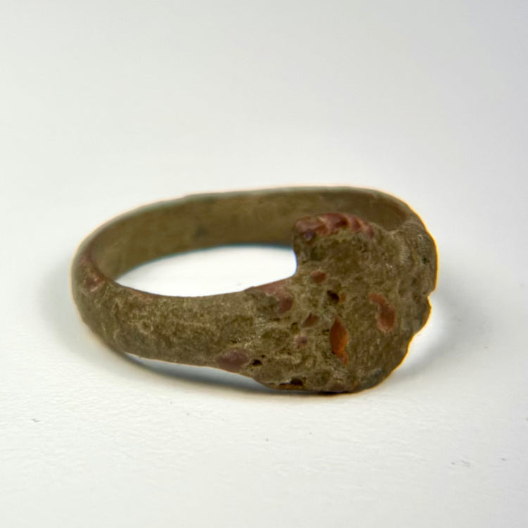 Ancient bronze ring from the 1st–5th century CE with balanced form and weathered surface finish