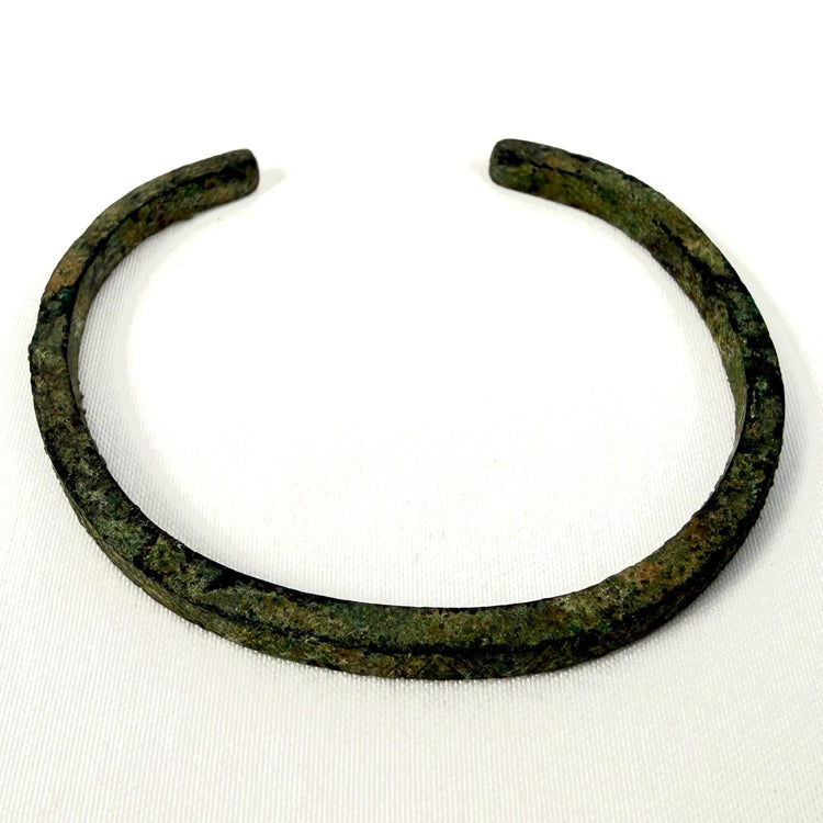 Archaeological bronze bracelet with open ends and naturally developed green surface patination