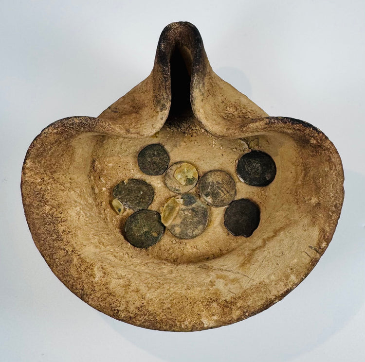 Museum-comparable terracotta saucer-shaped oil lamp from Carthage with bronze coins