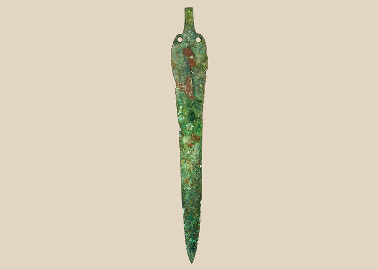 Ancient Caspian bronze blade with green patina and perforations