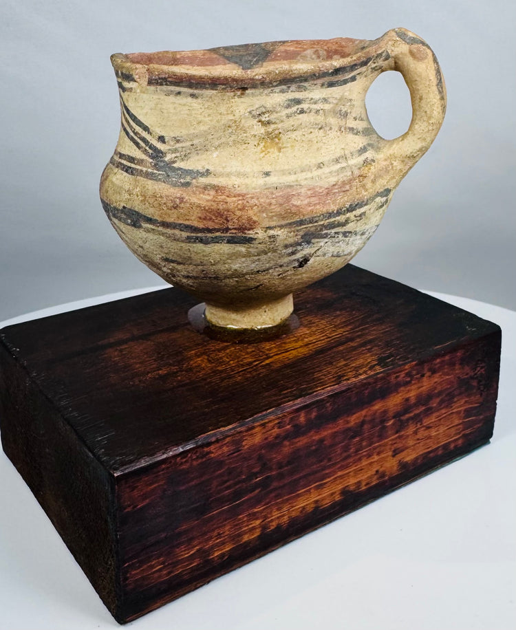 Hand-formed Chinese painted pottery vessel dating to the Neolithic period