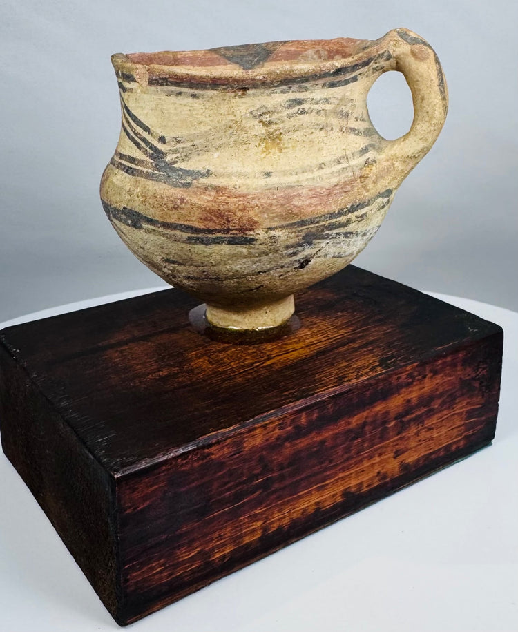 Hand-formed Chinese painted pottery vessel dating to the Neolithic period