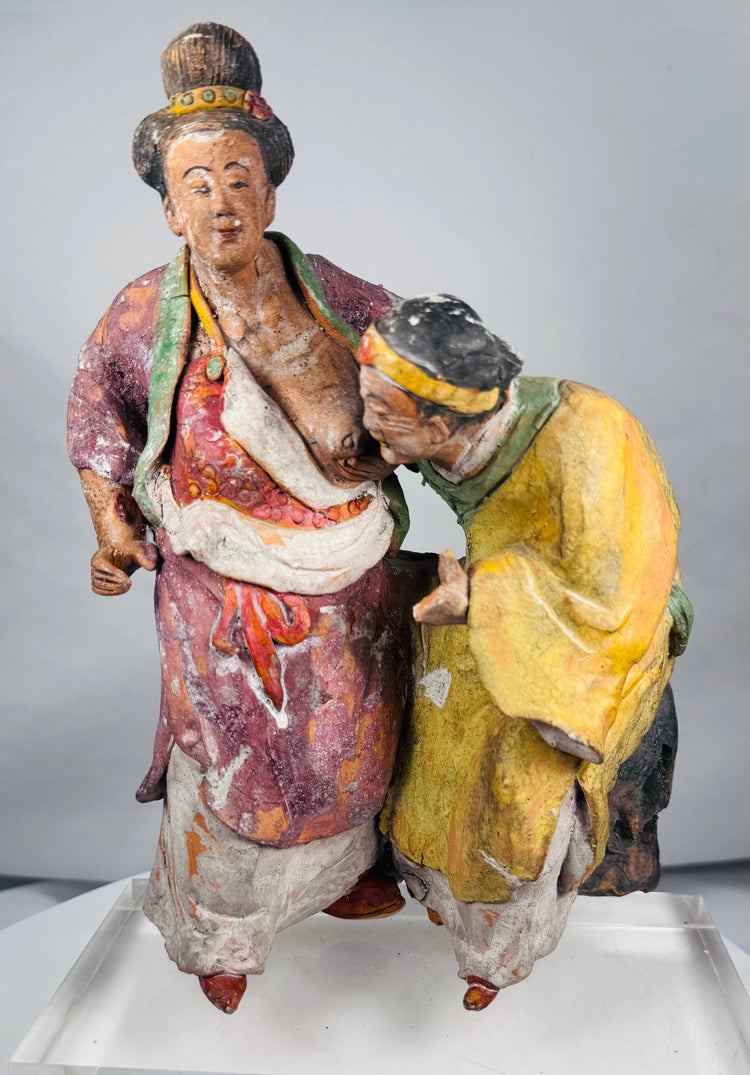 Ancient Chinese painted earthenware group mounted on a modern clear acrylic display stand