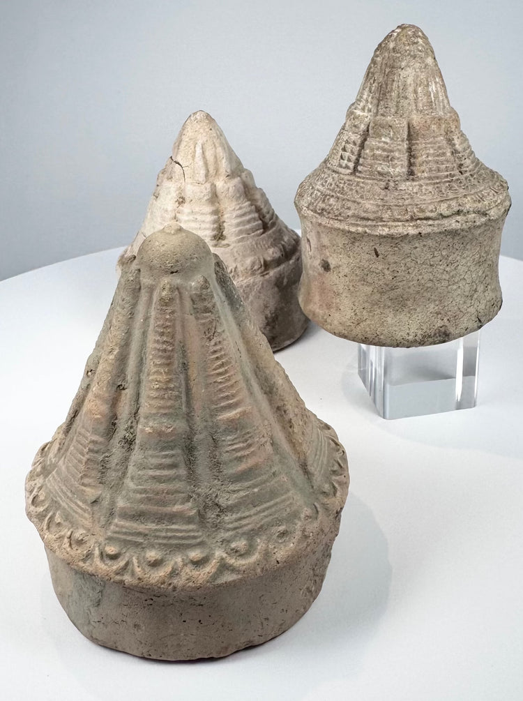 Three miniature terracotta stupas associated with the Buddhist traditions of Eastern India