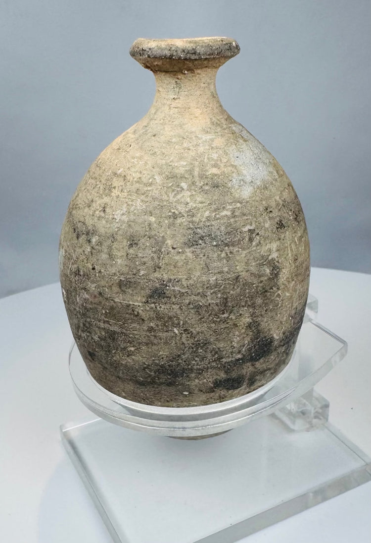 Eastern Mediterranean ceramic flask with narrow neck and pale burial accretions