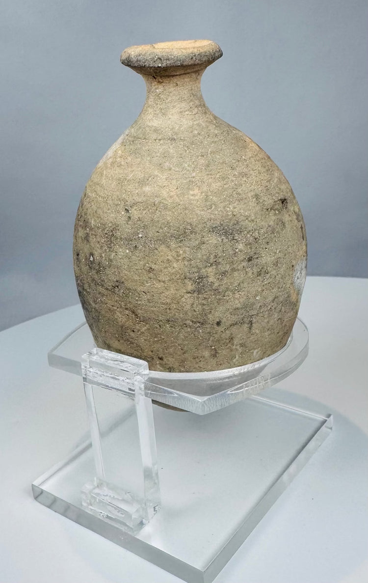 Ancient Levantine terracotta vessel with sloping shoulders and controlled-pour opening