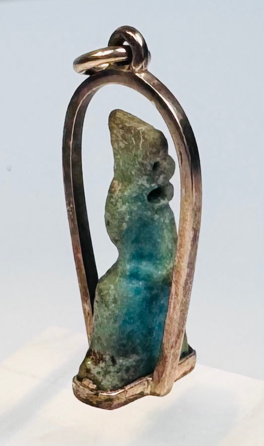 Ancient Egyptian protective amulet with columnar body and distinctive headdress