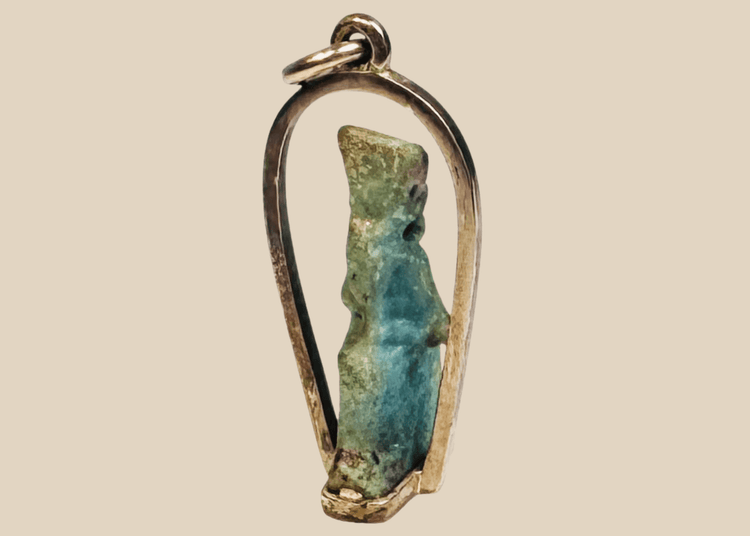 Ancient Egyptian blue-green faience deity amulet mounted in a later gold pendant setting
