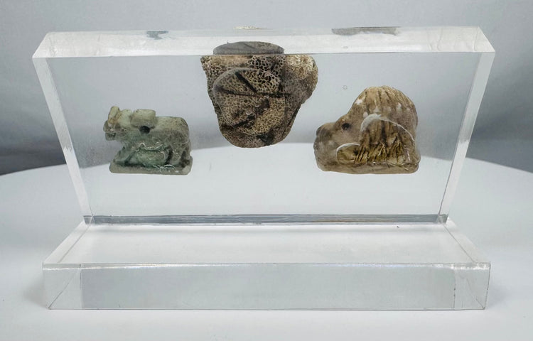 Three authentic ancient artifacts showcasing religious symbolism and artistic traditions of Egypt and the Greco-Roman world.