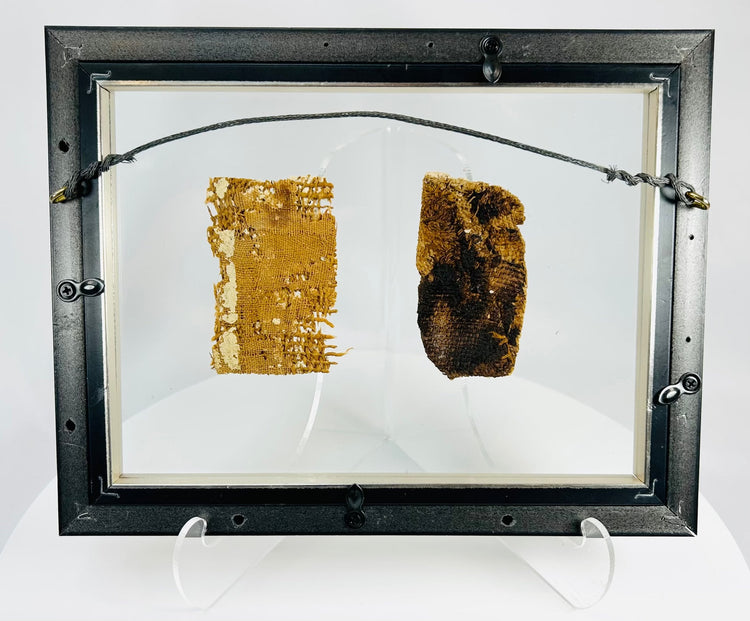 Ancient Egyptian burial fragments with classic profile figure and pigment traces
