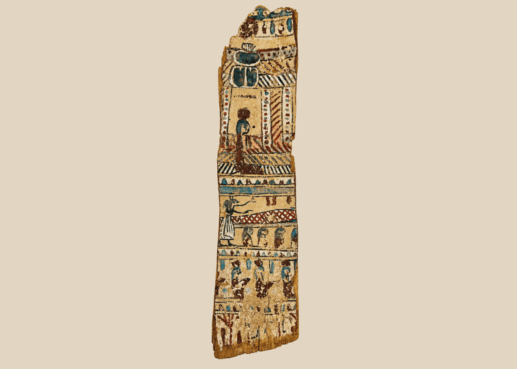 Front view of ancient Egyptian painted coffin fragment with colorful hieroglyphic scenes on beige background