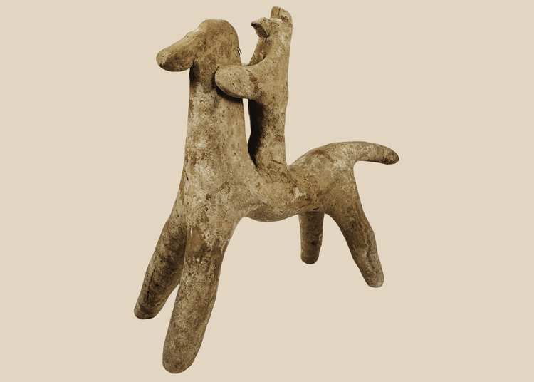 Ancient Greek Boeotian terracotta horse and rider figure dating to the Late Geometric and Early Archaic periods.