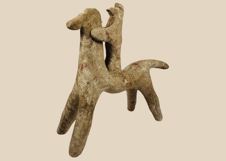 Ancient Greek Boeotian terracotta horse and rider figure dating to the Late Geometric and Early Archaic periods.