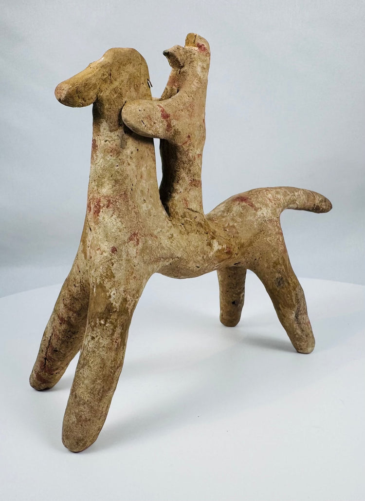 Ancient Boeotian horse and rider sculpture representing a traditional Greek votive offering from circa 700–500 BCE.