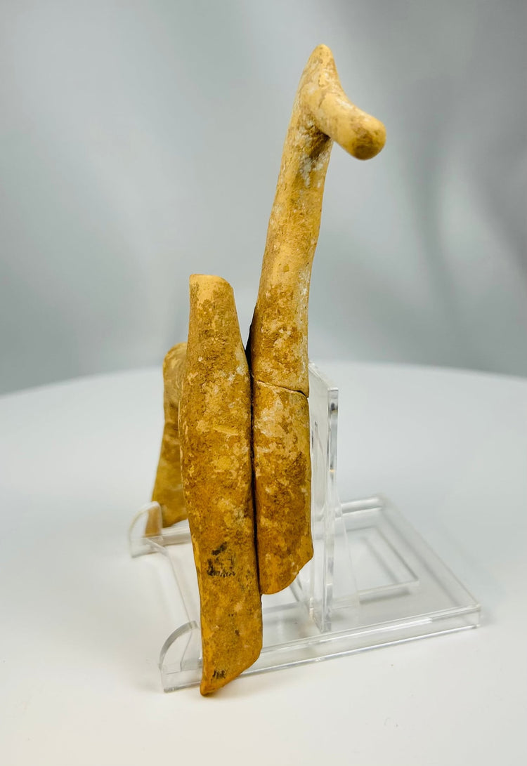 Small ancient Greek horse votive with elongated neck and stylized form