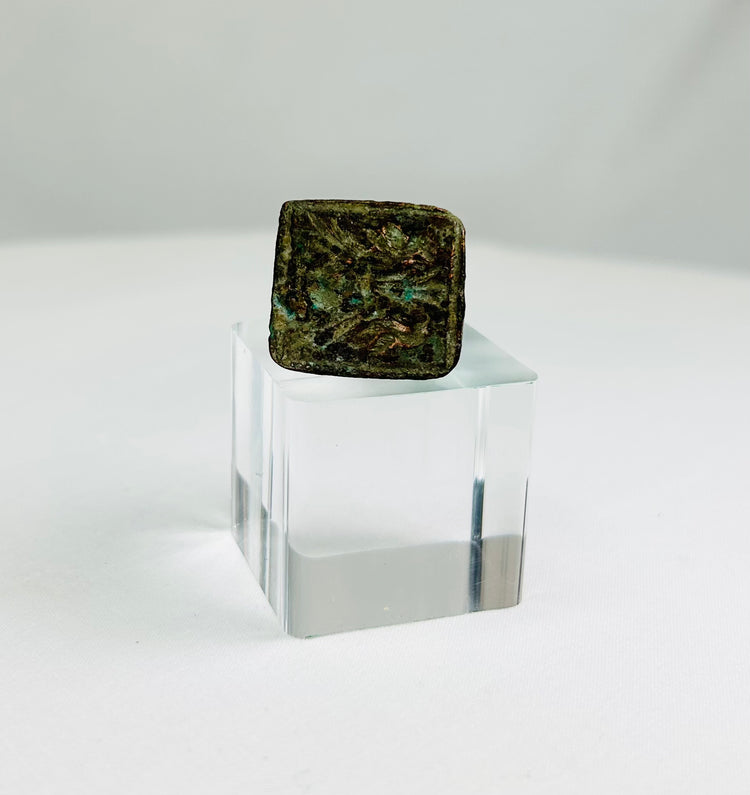 Early Roman or Near Eastern bronze ring featuring paired bird motif on square bezel