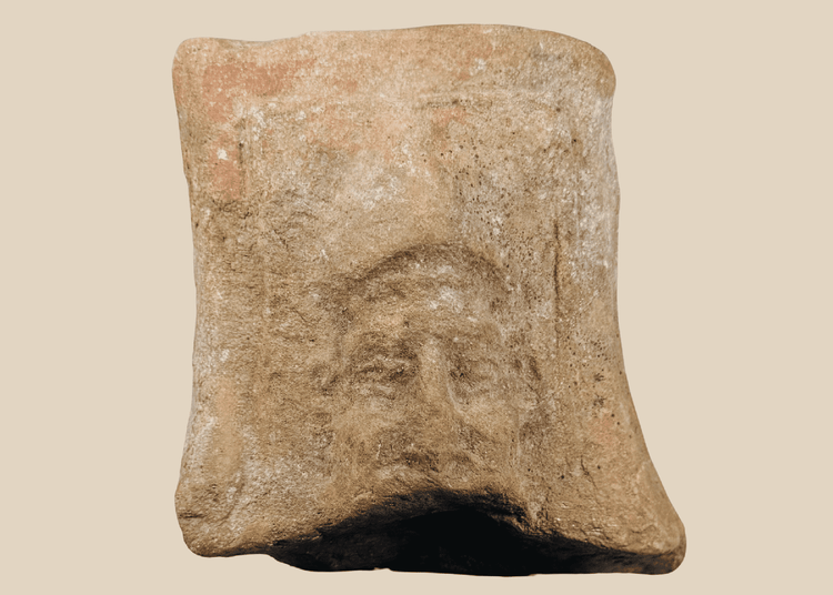 Ancient Hellenistic-Roman terracotta relief fragment depicting a mature male face
