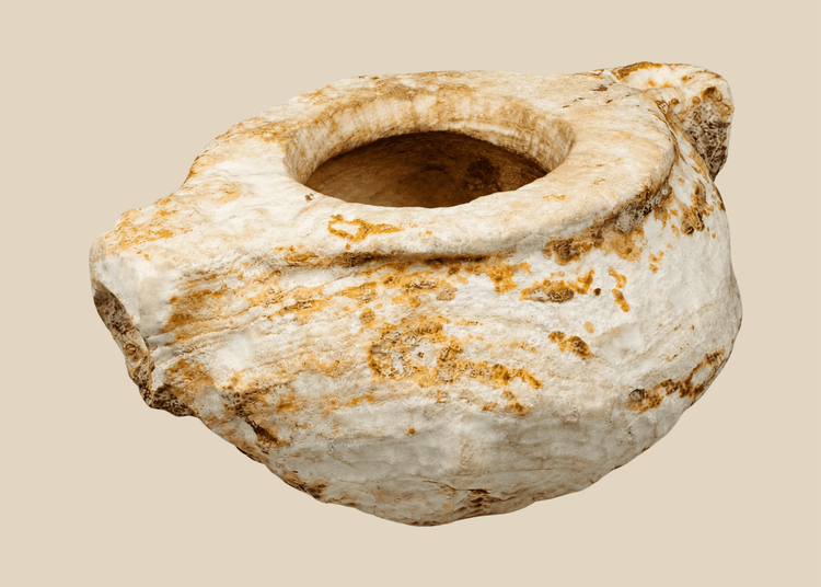 Ancient Middle Eastern carved white stone vessel with opposing lugs
