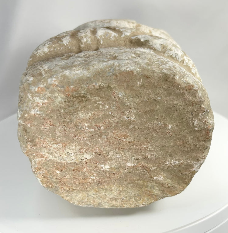 Early Bronze Age limestone sculpture with abstract form and archaeological patina