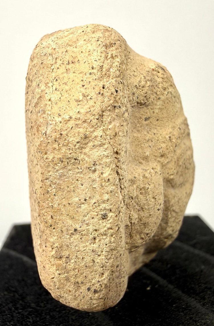 Fragmentary Near Eastern terracotta votive figure head with sculpted beard, almond-shaped eyes, and minor surface abrasions.