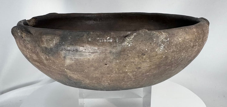 Ancient terracotta vessel displaying raised rim nodes and authentic age-related weathering