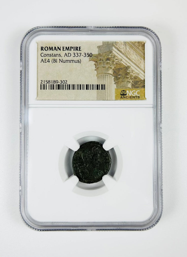 Late Roman Empire bronze coin depicting Emperor Constans, AE4 denomination, certified by NGC in protective holder.