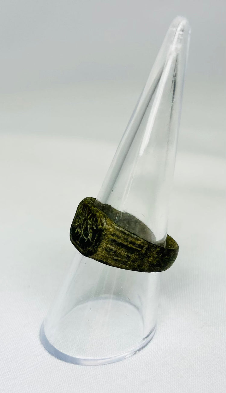 Side view of ancient Roman bronze ring, early Christian Chi-Rho symbol, 1st–4th Century CE, genuine antiquity from Relic and Rarity.